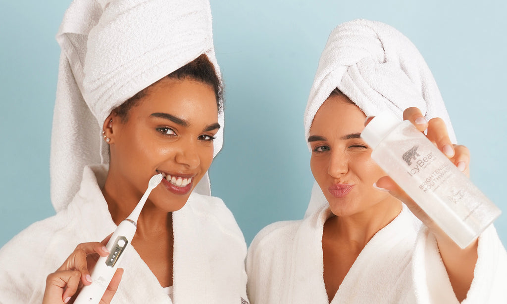 models with mouthwash and sonic toothbrush